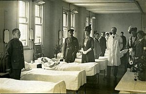 The King and Queen visiting the wounded.