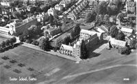 Exeter School showing the playing fields and students formed up in rows