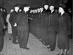 Police parade with first female police officer 1954