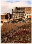 Demolishing shops in Bedford Street - photo David Cornforth