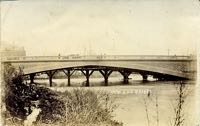 The piers for the temporary wooden bridge can be seen under the arch of the new bridge