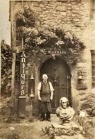 A workman by the rear entrance to Murray's Antiques