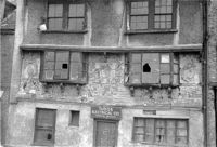 The derelict front of the Tudor House.