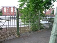 The gate in the iron fence at the Northernhay Walk