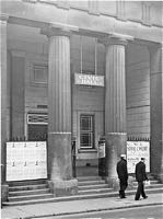 US sailors walking past the entrance to the Civic Hall