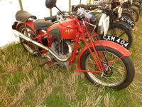 An AJW motorcycle at a motorcycle show