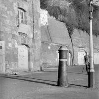 One of the cannon embedded into the quay