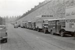 Bakery vehicles park as bakery is flooded