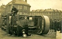 Tram on its side