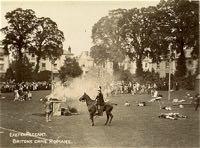 A horse gallops across a battleground during the pageant