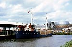 MV Bapa unloading timber.