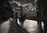 Horse towing ship by moonlight