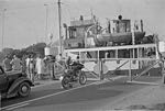 A ship glides past the traffic 1961